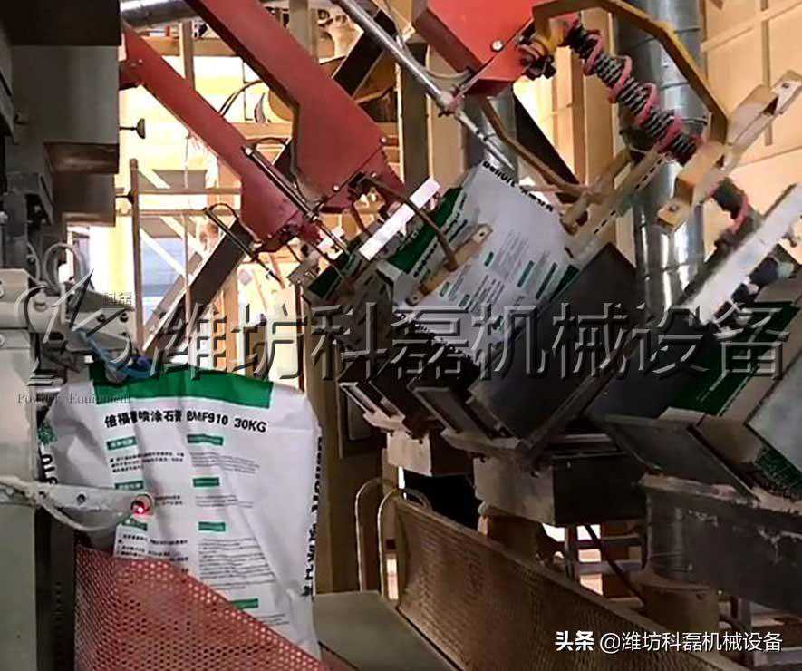 浅谈完全替代人工上袋的全自动阀口上袋机